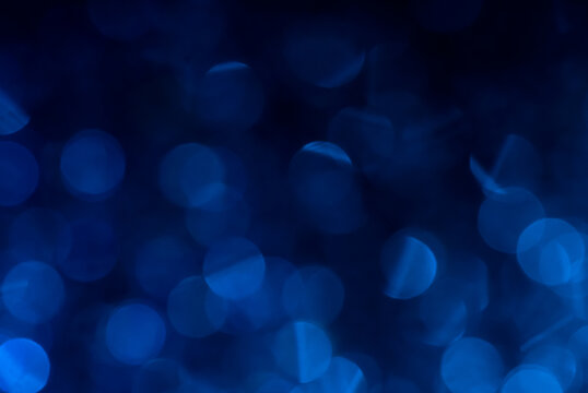 Blue bokeh fading to black at top
