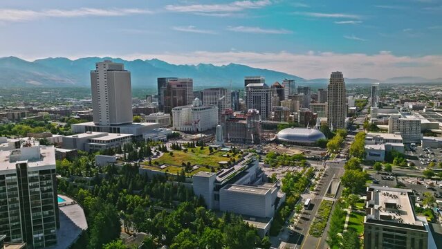 Salt Lake City Utah Skyline At Day, Mountains Behind, Aerial Drone