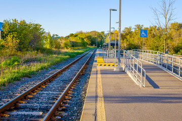 An accessibility ramp at an empty commuter train station in Stouffville Ontario.