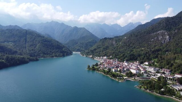 Scenic aerial footage of Barcis, Italy. Fascinating aerial views of Barcis Village, Lake Barcis and Dolomites mountains (Alps).