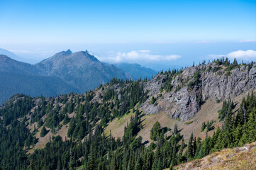 Cloud inversion seen from Hurricane Ridge in Olympic National Park, Washington on sunny autumn afternoon.