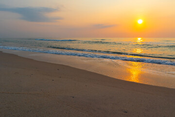 Summer time background with sun rises on the beach.