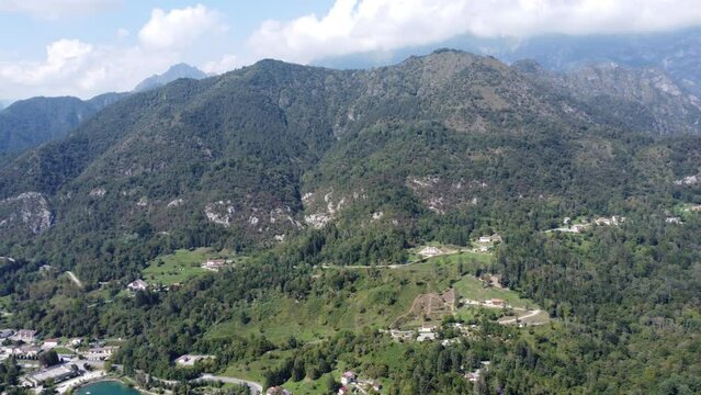 Scenic aerial footage of Barcis, Italy. Fascinating aerial views of Barcis Village, Lake Barcis and Dolomites mountains (Alps).