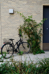 bicycle in front of wall