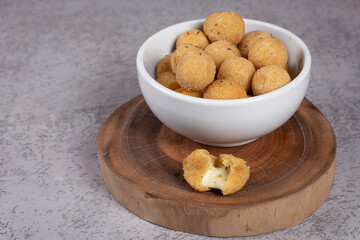 Deep fried Cheese balls. Delicious .Brazilian snacks, fried balls stuffed with cheese.
