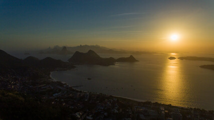 Aerial view of the sunset over Guanabara Bay from the City Park of Niterói. In the background, the...