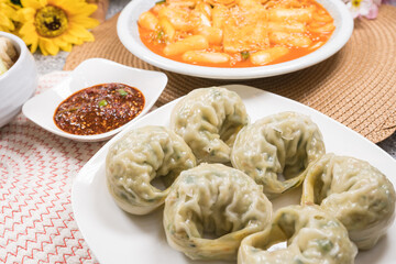 Steamed dumplings ( mandu ) and Stir fried Rice Cake - Korean food
