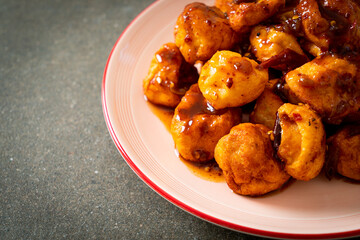 fried meatballs with spicy dipping sauce