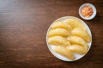 Fresh peeled pomelo, grapefruit or shaddock