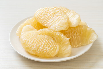 Fresh peeled pomelo, grapefruit or shaddock