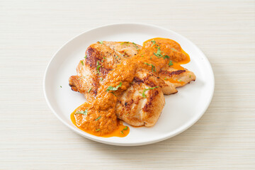 grilled chicken steak with red curry sauce