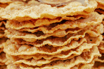 Homemade fritters for sale at a street food stall