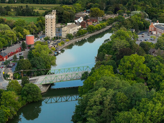 Early evening aerial photo of Schoen Place and the Erie Canal in the Village of Pittsford, New York.
