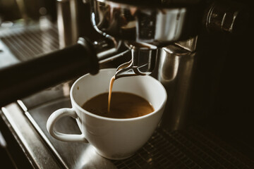 espresso machine in coffee shop counter offering freshly brewed coffee. coffee maker concept.