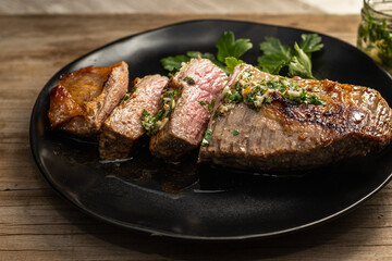 juicy roast beef cut with garlic and parsley aioli