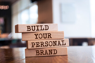 Wooden blocks with words 'Build Your Personal Brand'.