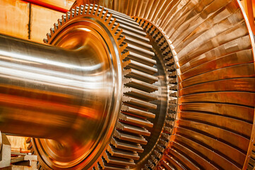 Rotor of modern steam turbine in plant workshop closeup
