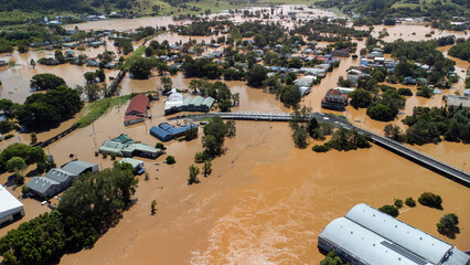 Flooded river engulfing buildings and bridges in Lismore NSW Australia 2022