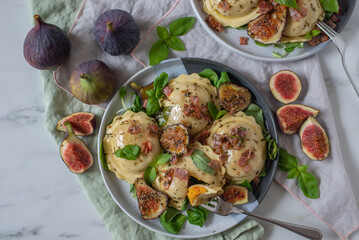pumpkin tortellini with fresh figs and herbs