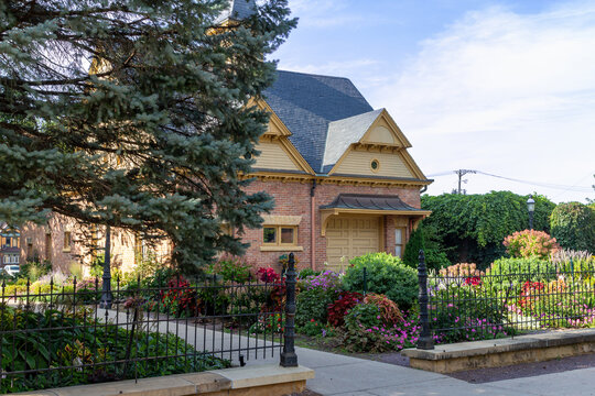 Daytime exterior view of the historic Rensselaer D. Hubbard Carriage House and public garden on September 17, 2022 in Mankato, Minnesota, USA