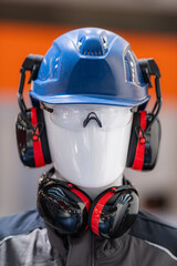 PPE - Industrial Work Safety and Personal Protection Equipment on Display. Safety helmet and...