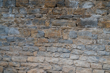 stone facade wall high background of house brick horizontal stones wallpaper
