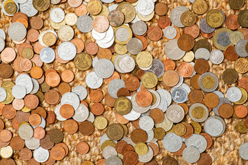 different coins on the white background