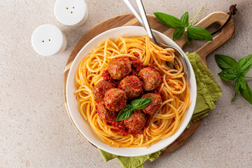 Spaghetti and beef Meatballs with tomato sauce. Top view. Copy space.