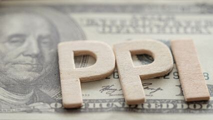 Text PPI message is placed on the dollar. PRODUCER PRICE INDEX (PPI) numbers on the dollar concept.
