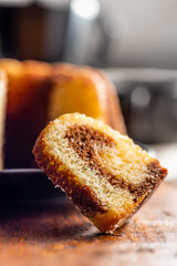 Sweet sponge cake. Bundt cake on wooden table.