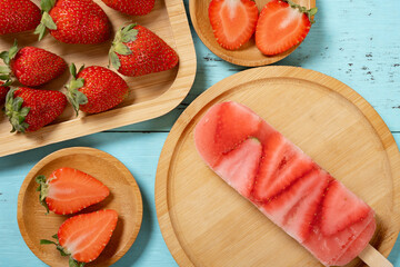 top view strawberry slices popsicle with fresh strawberries