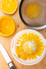 making fresh orange juice at home vertical composition