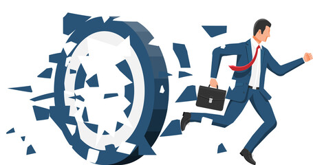 Businessman running and breaking target.