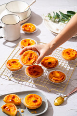 Egg tart, traditional Portuguese dessert, pastel de nata. Pasteis de Belem is a Portuguese egg custard tart pastry dusted with cinnamon.