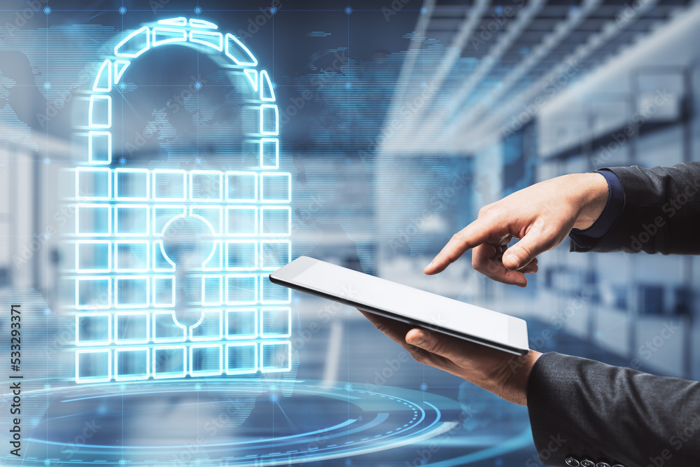 Poster close up of businessman hand pointing at cellphone with abstract glowing padlock hologram on blurry 