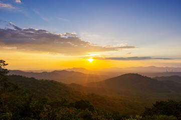 Beautiful  landscape sunset over peak Mountain with warm light Mae Moh  Lampang, Thailand. - 533295311