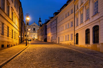 Fototapeta na wymiar New Town Mostowa Street In Warsaw At Night In Poland