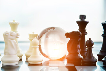 Glass globe on chess board