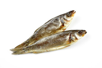 Dried mullet. Close-up, selective focus. White background.