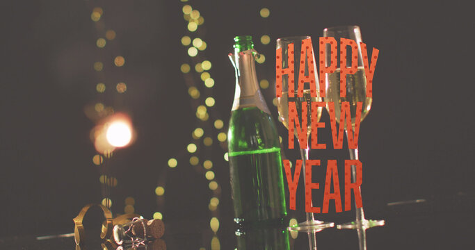 Image of happy new year text in red over sparkler, lights, champagne bottle and glasses