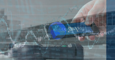 Image of financial data processing over man with smartphone and payment terminal