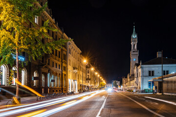 Germany, Baden-Wurttemberg, Konstanz, Vehicle light trails stretching along city street at night