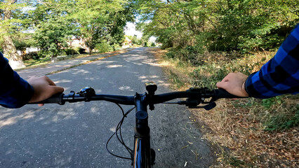 Gravel bicycle ride on the road in the summer season