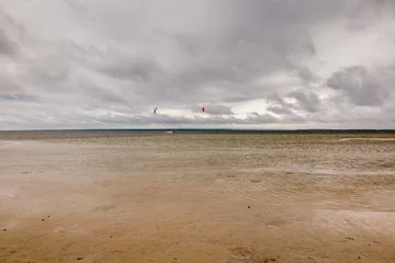 Foto op Plexiglas Learning Kitesurfing in the shallow waters of the Puck Bay from the side of the Hel Peninsula © rparys