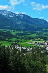 Fototapeta na wymiar Austrian Alps - view from the Wurbauerkogel chairlift to the town of Windischgarsten and the Totes Gebirge mountains