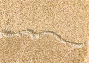 wave on sand beach