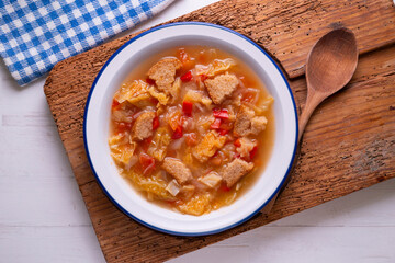 Menorcan soup. Traditional recipe from the island of Menorca in the Balearic Islands. Traditional tapas from the islands with bread, peppers and white cabbage.