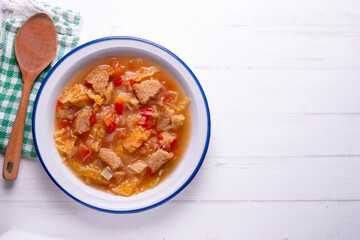 Menorcan soup. Traditional recipe from the island of Menorca in the Balearic Islands. Traditional tapas from the islands with bread, peppers and white cabbage.