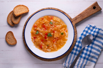 Menorcan soup. Traditional recipe from the island of Menorca in the Balearic Islands. Traditional tapas from the islands with bread, peppers and white cabbage.