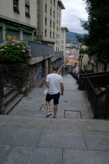 Fototapeta na wymiar Man walking in an urban environment